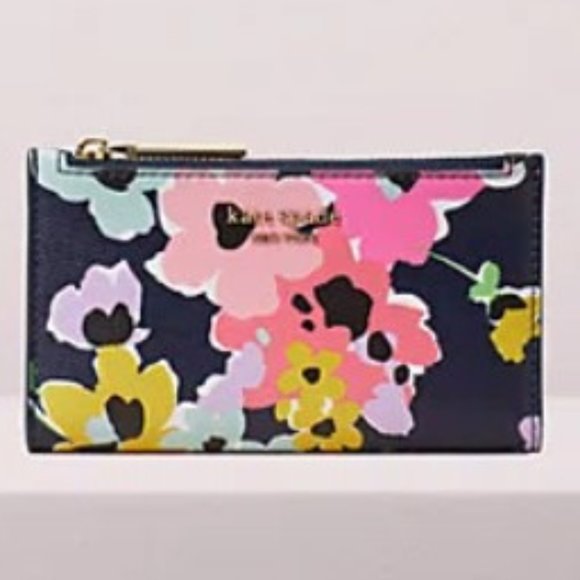 kate spade Handbags - KATE SPADE sylvia floral slim bifold wallet